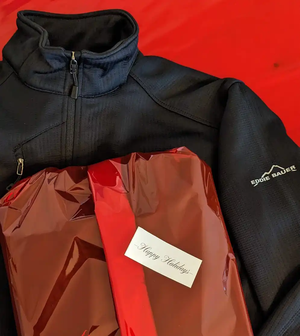 Eddie Bauer branded jacket with custom gift packaging - premium corporate gifts and executive promotional merchandise.