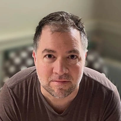 Thomas Mauriello, a casual head shot staring straight into the camera, is the head of brand strategy & digital experience at Business Boosters, located in the New York Metro area.