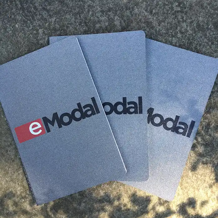 Stitched traveler notebooks with full-color printed logistics company logo for professional corporate gifts