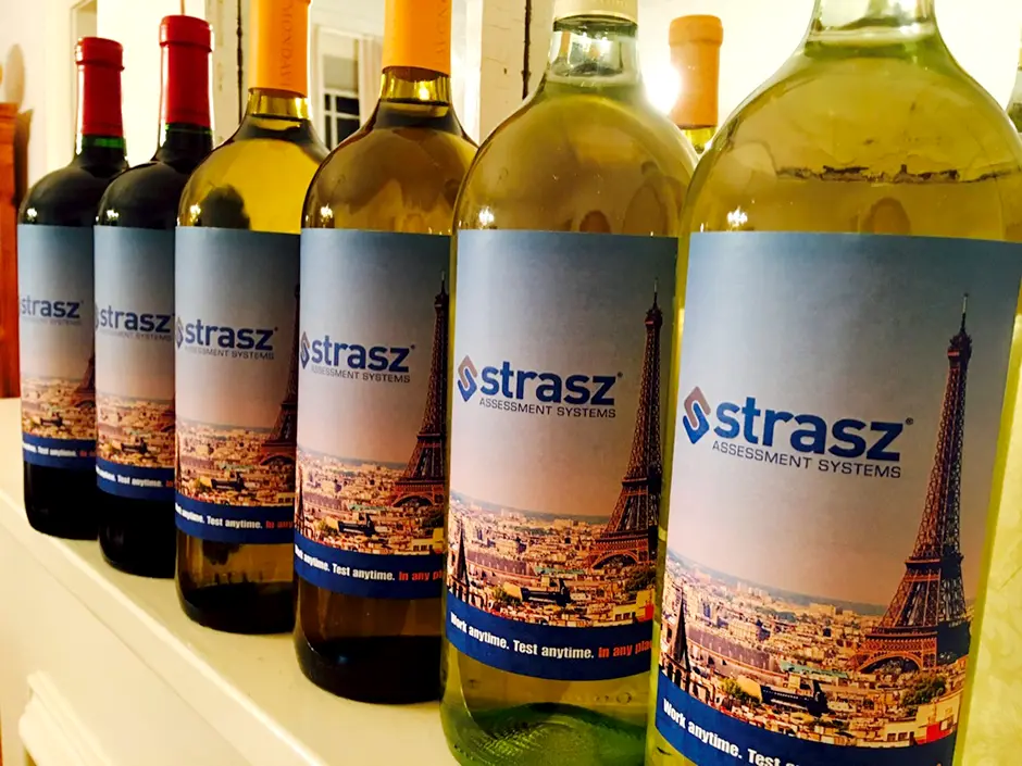 Custom printed wine bottle labels with software company corporate branding for client appreciation gifts
