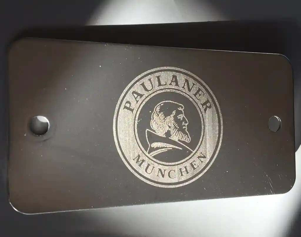 Laser etched stainless steel nameplate for custom portable BBQ grill with beverage company branding