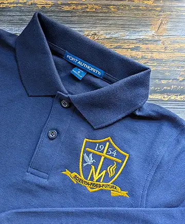 Port Authority youth polo with custom two-color embroidered school logo - branded uniforms for schools and organizations