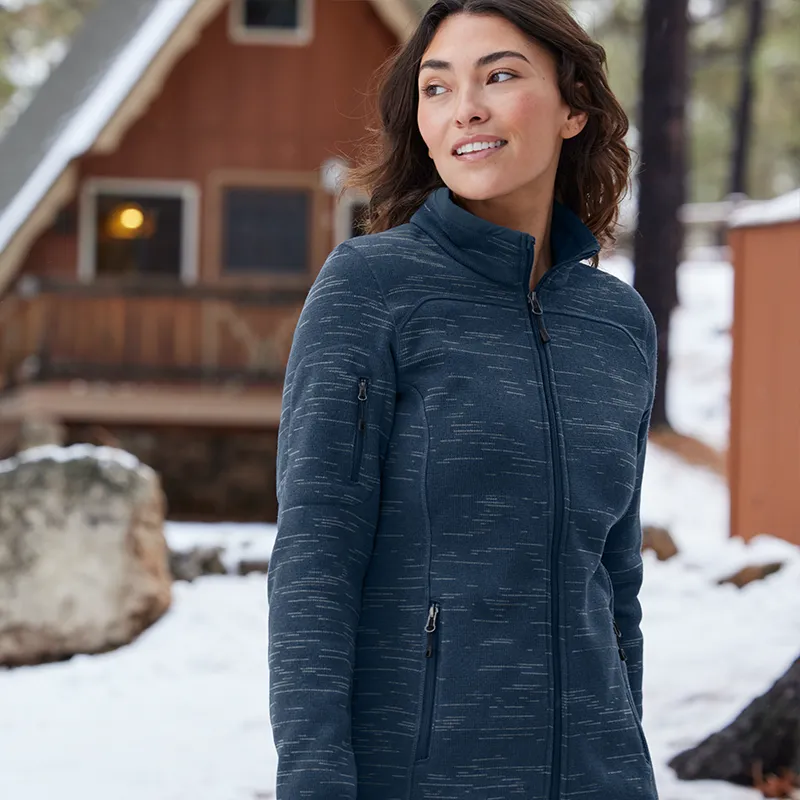 Woman wearing an Eddie Bauer heathered fleece jacket outdoors in winter