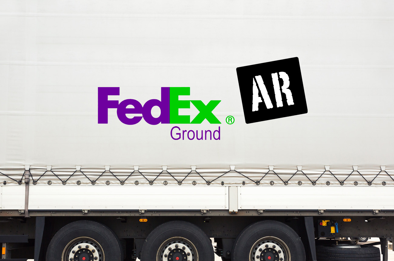 FedEx AR Logo over side of truck.