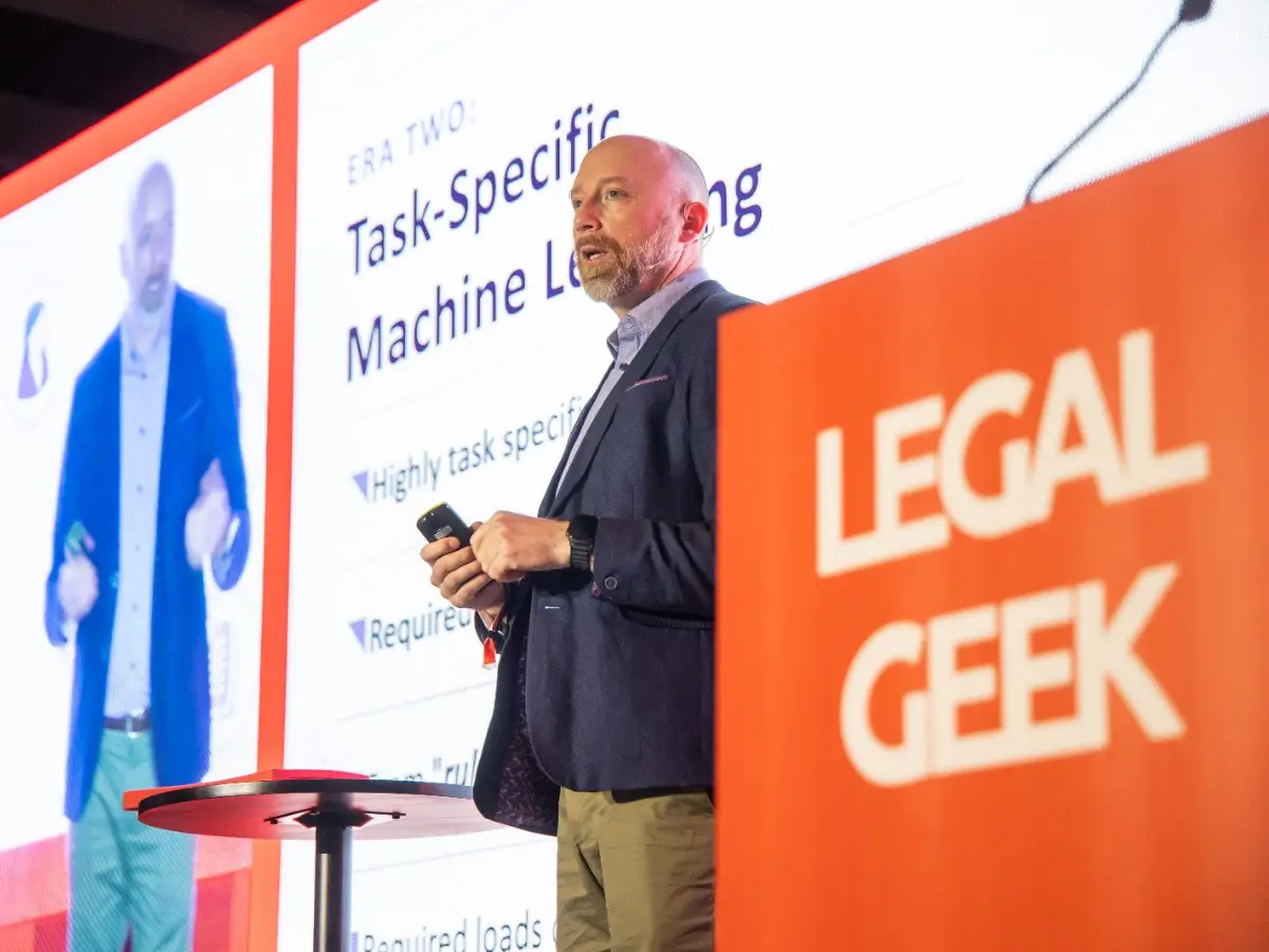 Presenter at Legal Geek discusses task-specific machine learning during agentic AI talk, emphasizing key lessons for legal operations evolution.