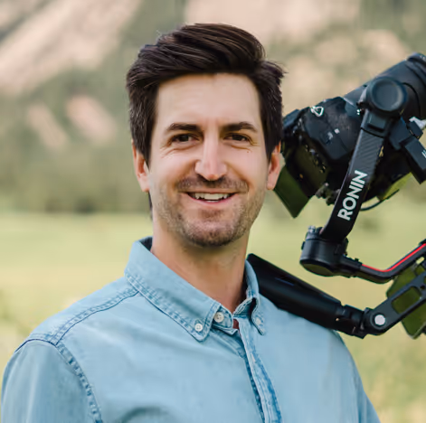 image of a man holding a camera