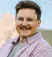 image of a smiling man with glasses on