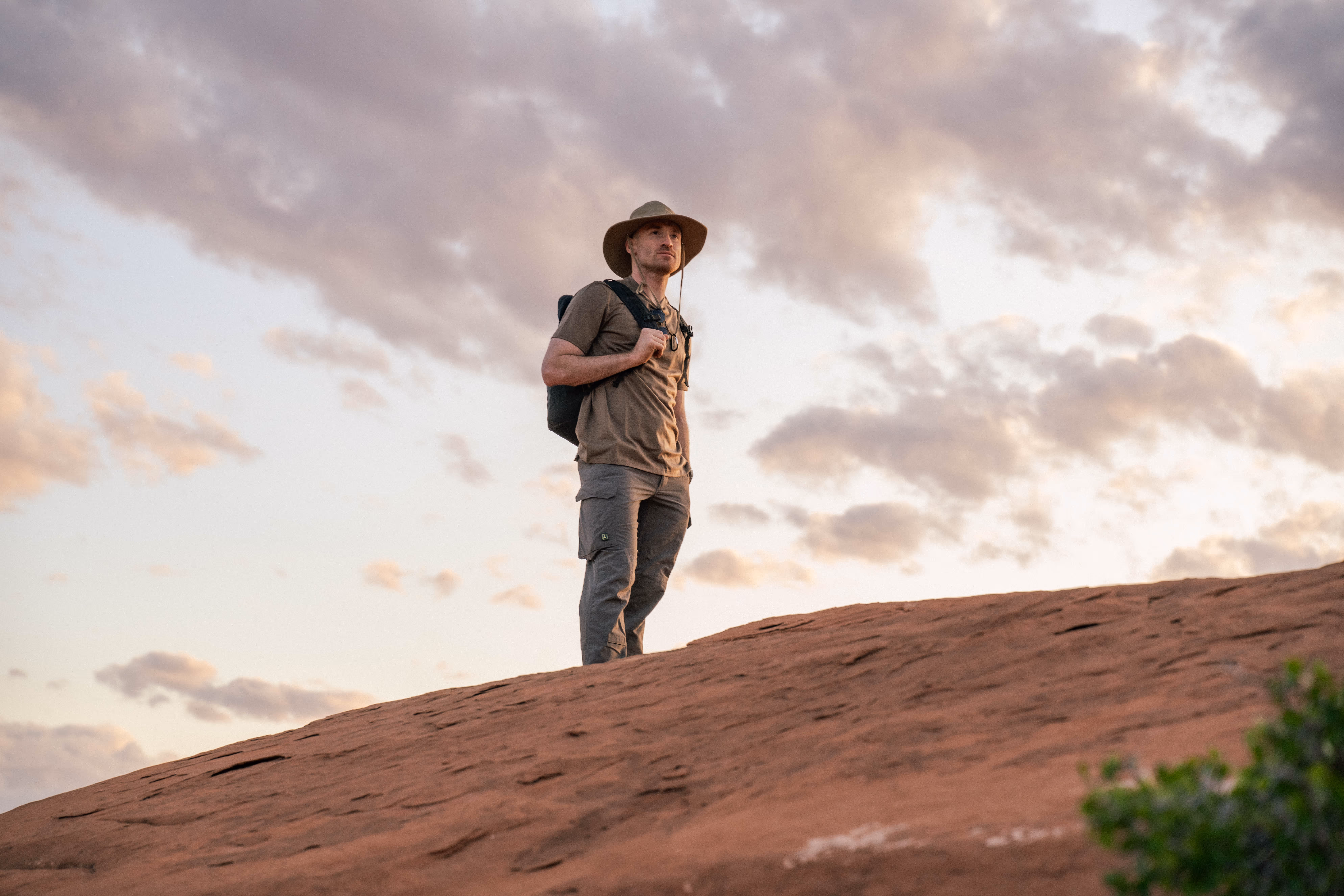 A model in the desert posing for a denver photography shoot.