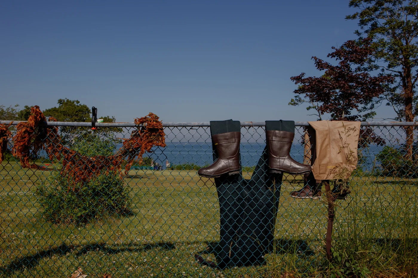 Clothing hangs to dry in the sun.