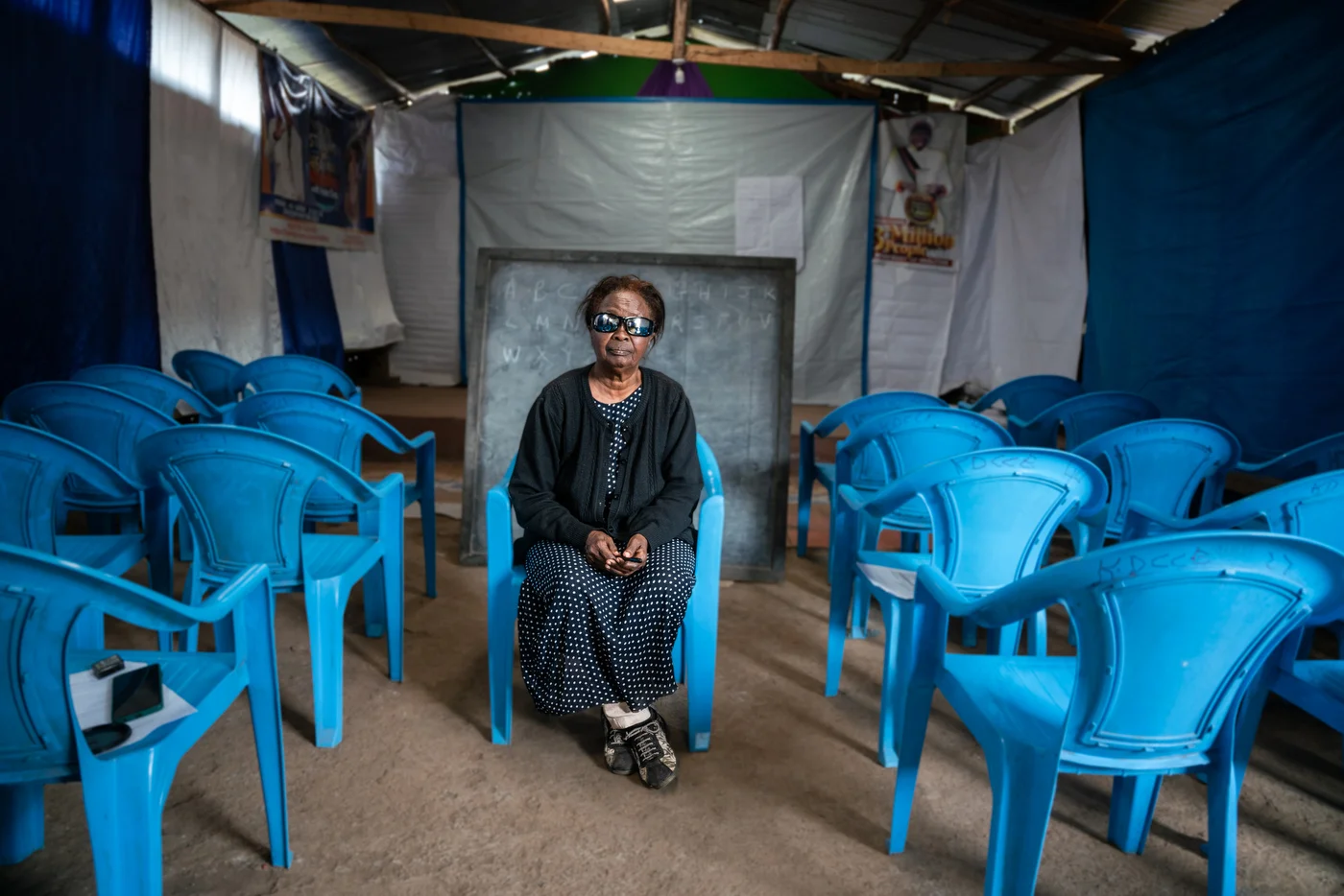 Teacher Alice is the heart and soul of the learning sessions at Kibera Day Care Center for the Elderly.