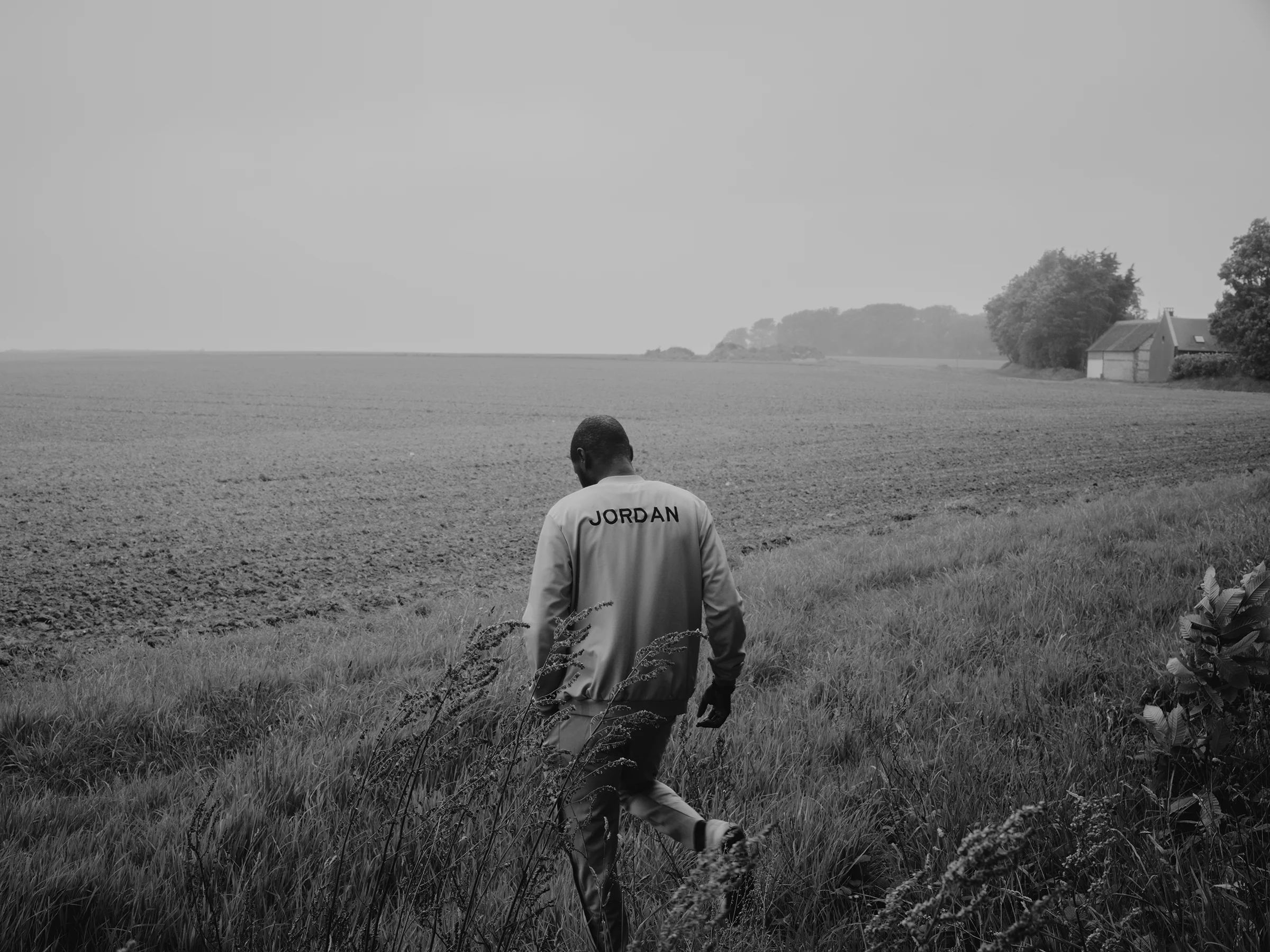 Alhassane walking along the cliffs near Marianne and Valéry’s home in Vattetot-sur-Mer, Normandy, where he often stayed during school holidays.