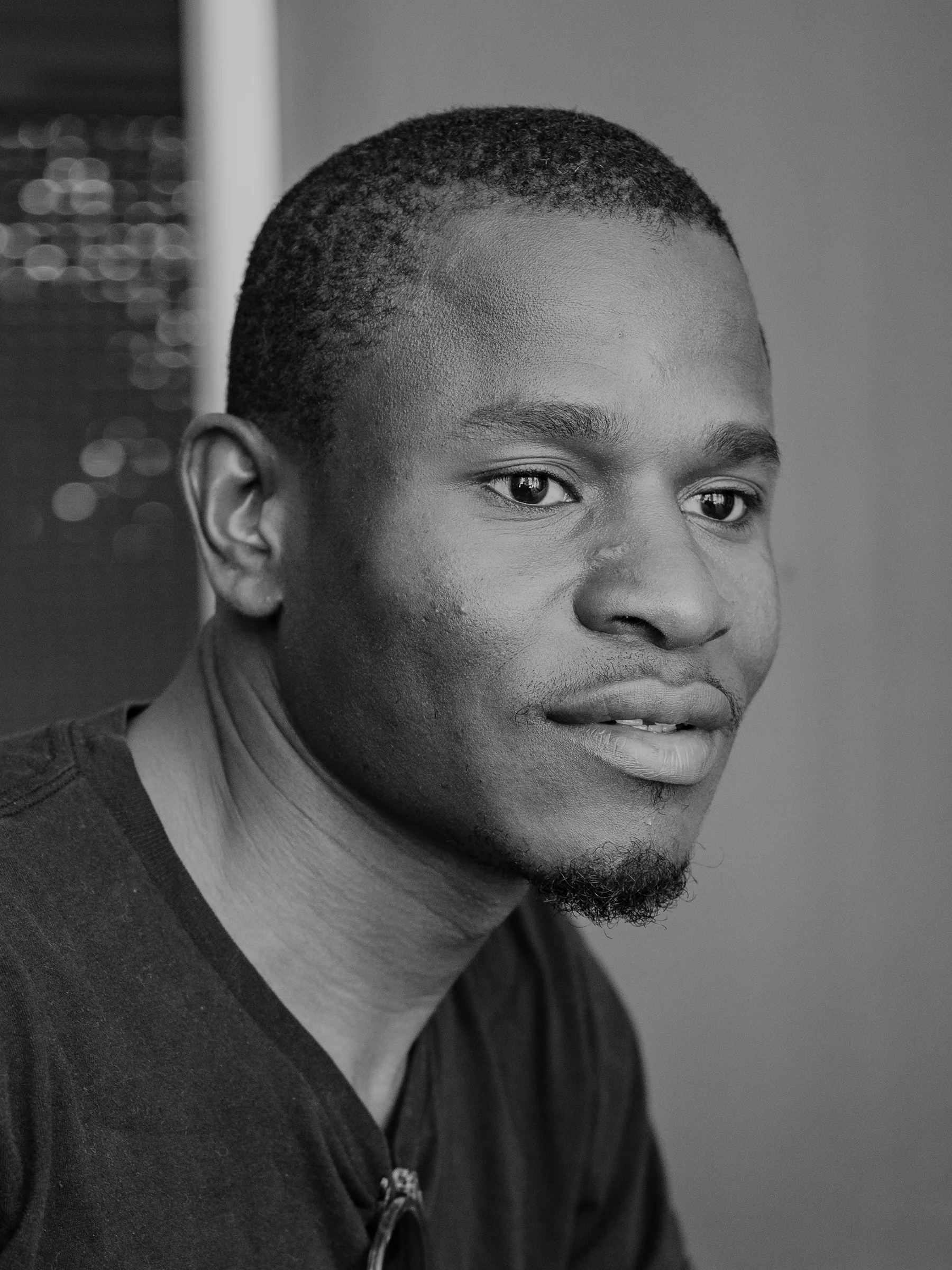 Ahmad in his home in Le Havre, which he was able to buy with support from Véronique. Now living independently, he continues to build his future.