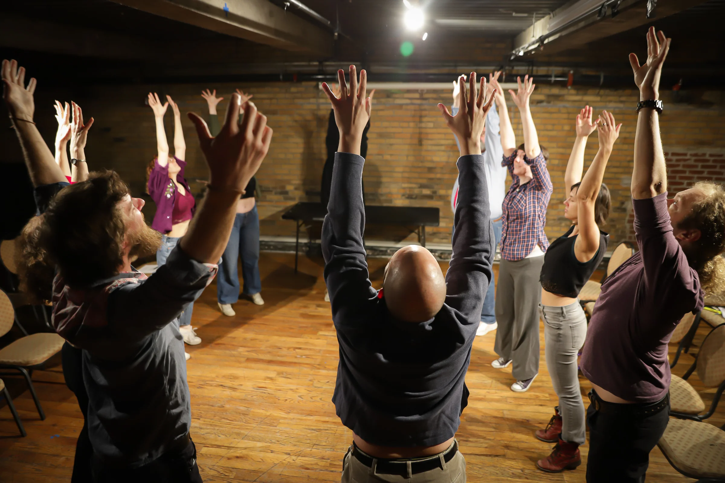 Docbloc's Intergenerational Theatre Lab members warming up.