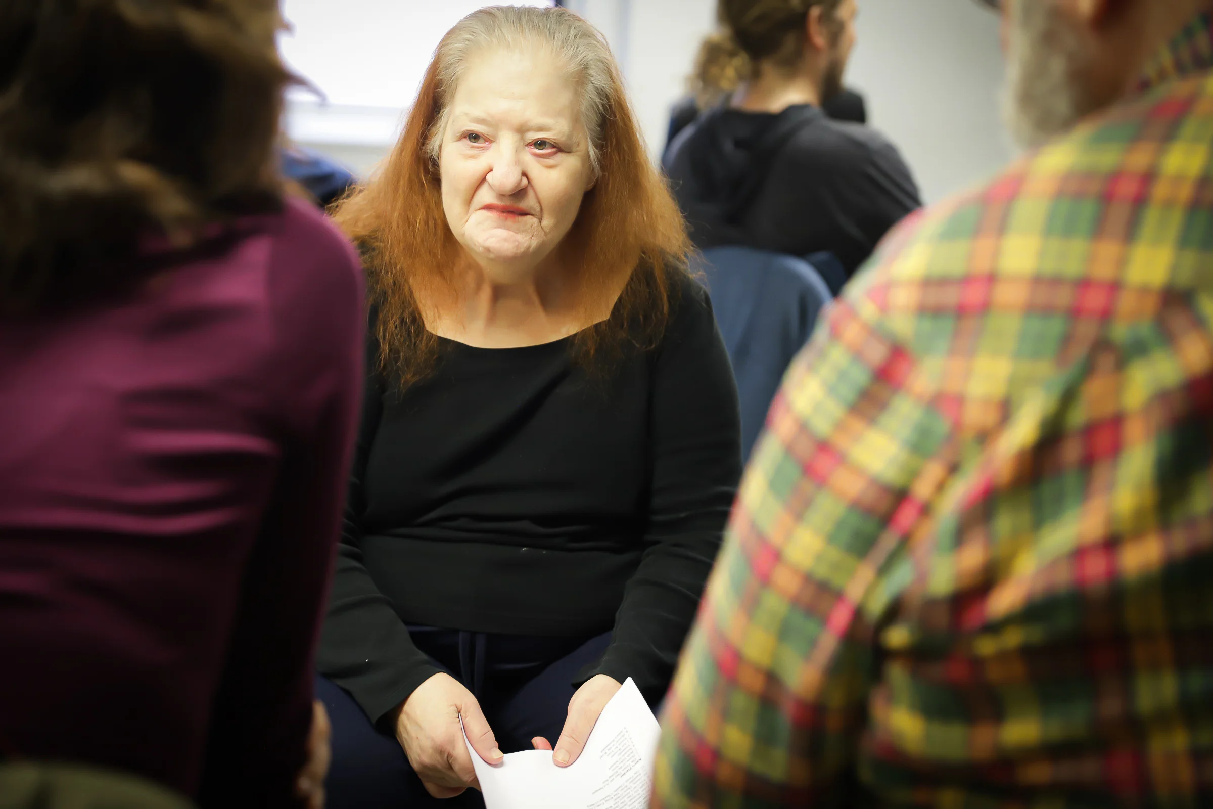Joanie HF Zosike works with the "Baby Boomer Cohort" to develp an original scene about generational stereotypes during Docbloc's Intergenerational Theatre Lab.