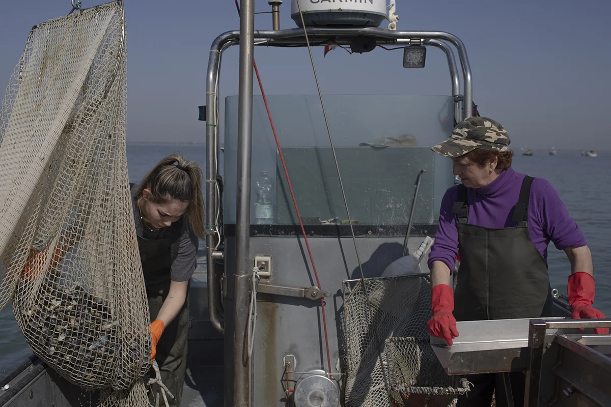 Alessia Turri is fishing alongside her grandmother, who at the time began working as a fisherwoman in the delta after her husband’s death, to support the family.