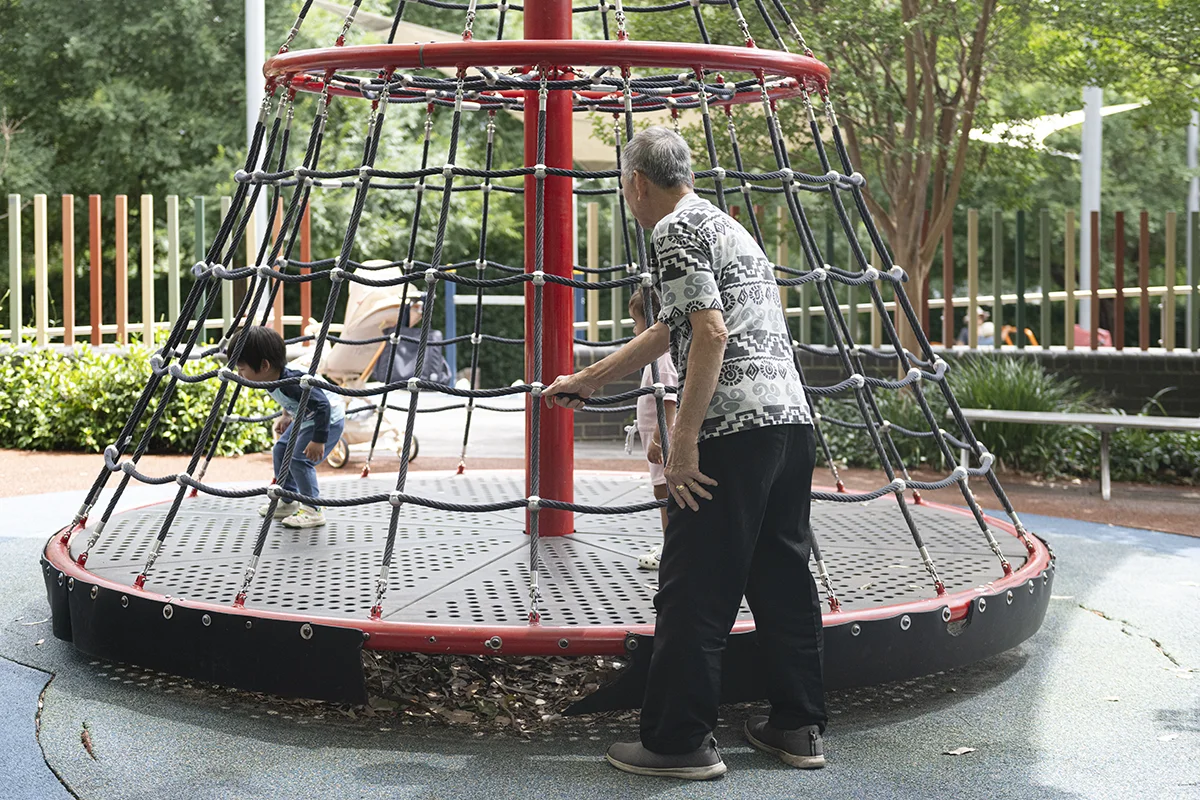 An older adult enjoys interacting with young children. Dec 8, 2025