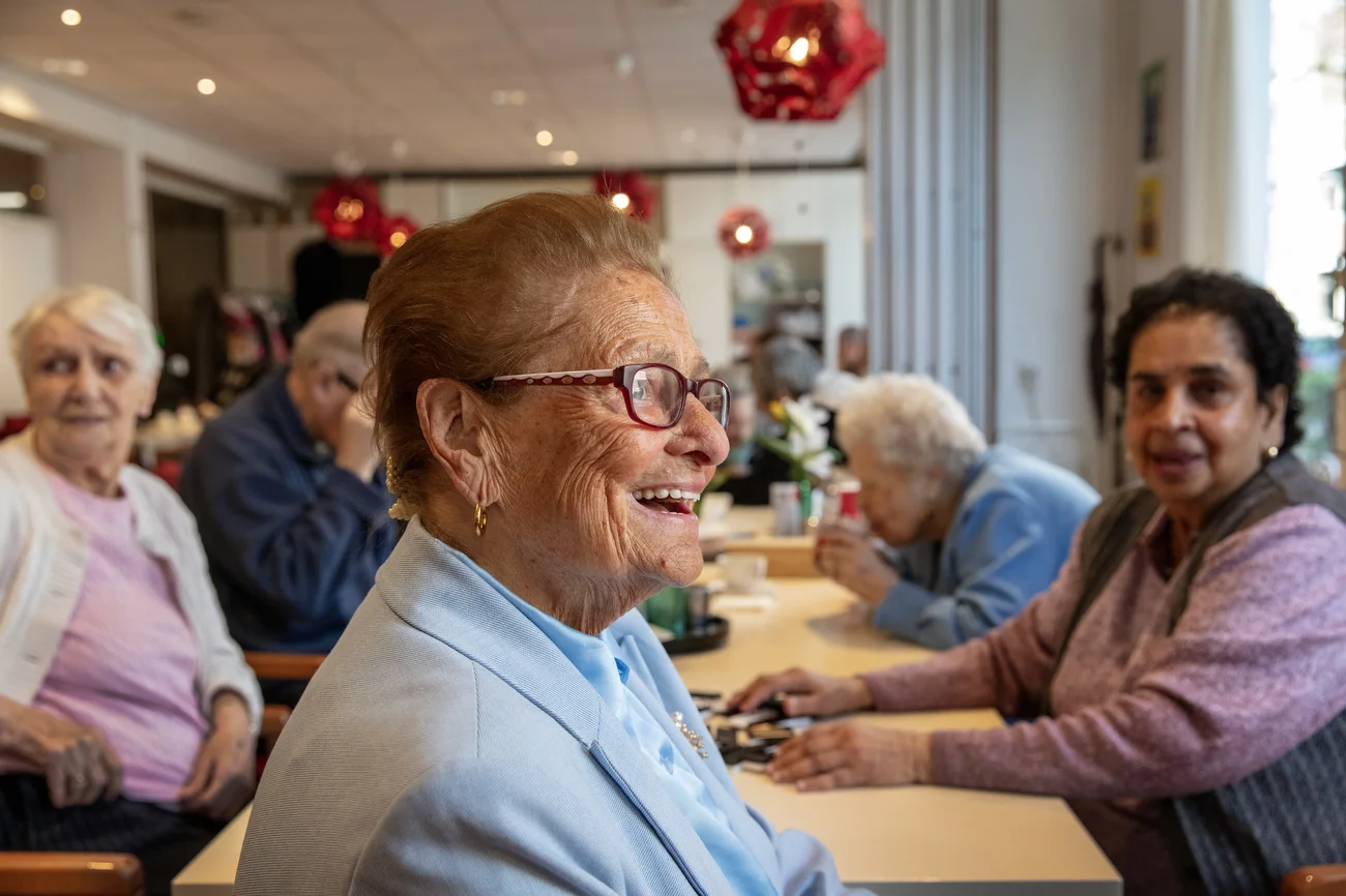 Maria Catharina de Jager-Alderding, 90, hanging out and playing dominoes at the Klinker  assisted living facility in Amsterdam, Netherlands on April 16, 2026.