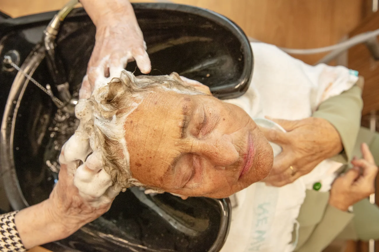 Maria Catharina de Jager-Alderding, 90, getting her hair done at the Klinker, an assisted living facility in Amsterdam, Netherlands on April 15, 2026.