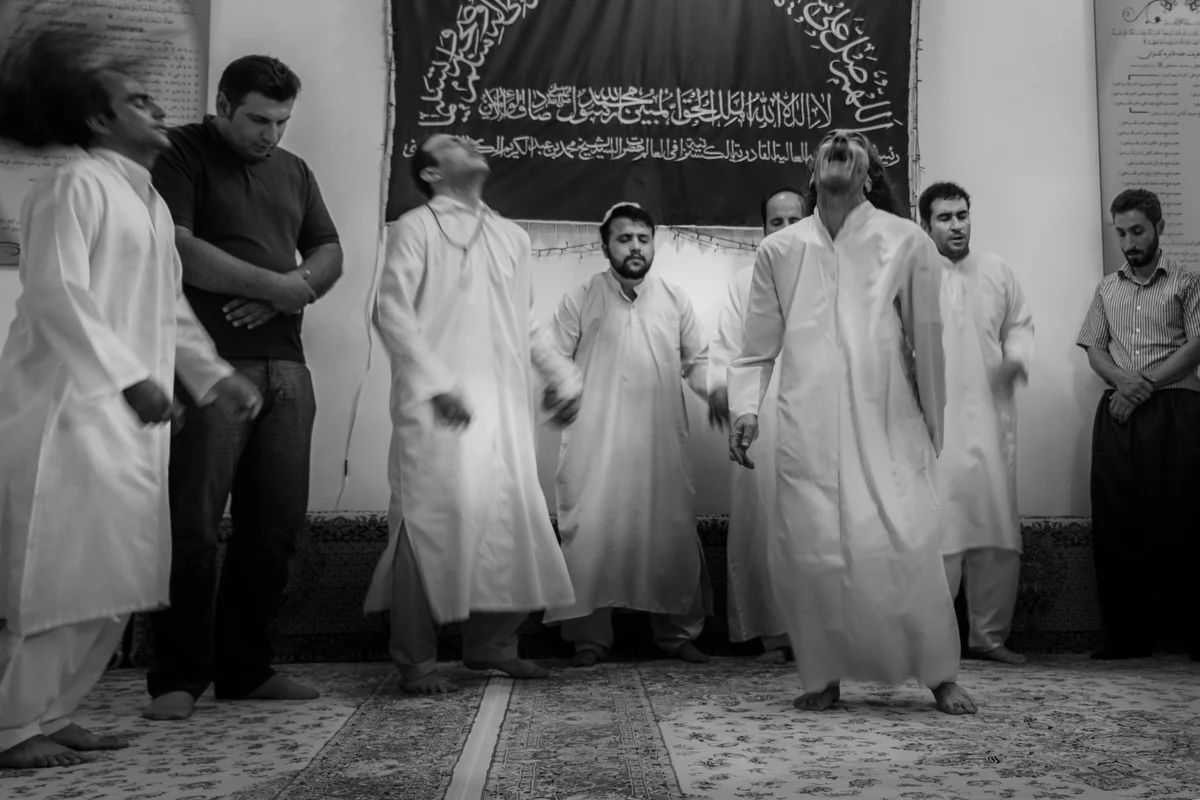 Dervishes of Kasenzani move their heads rhythmically during the collective chanting, entering a state of intense concentration and spiritual ecstasy.