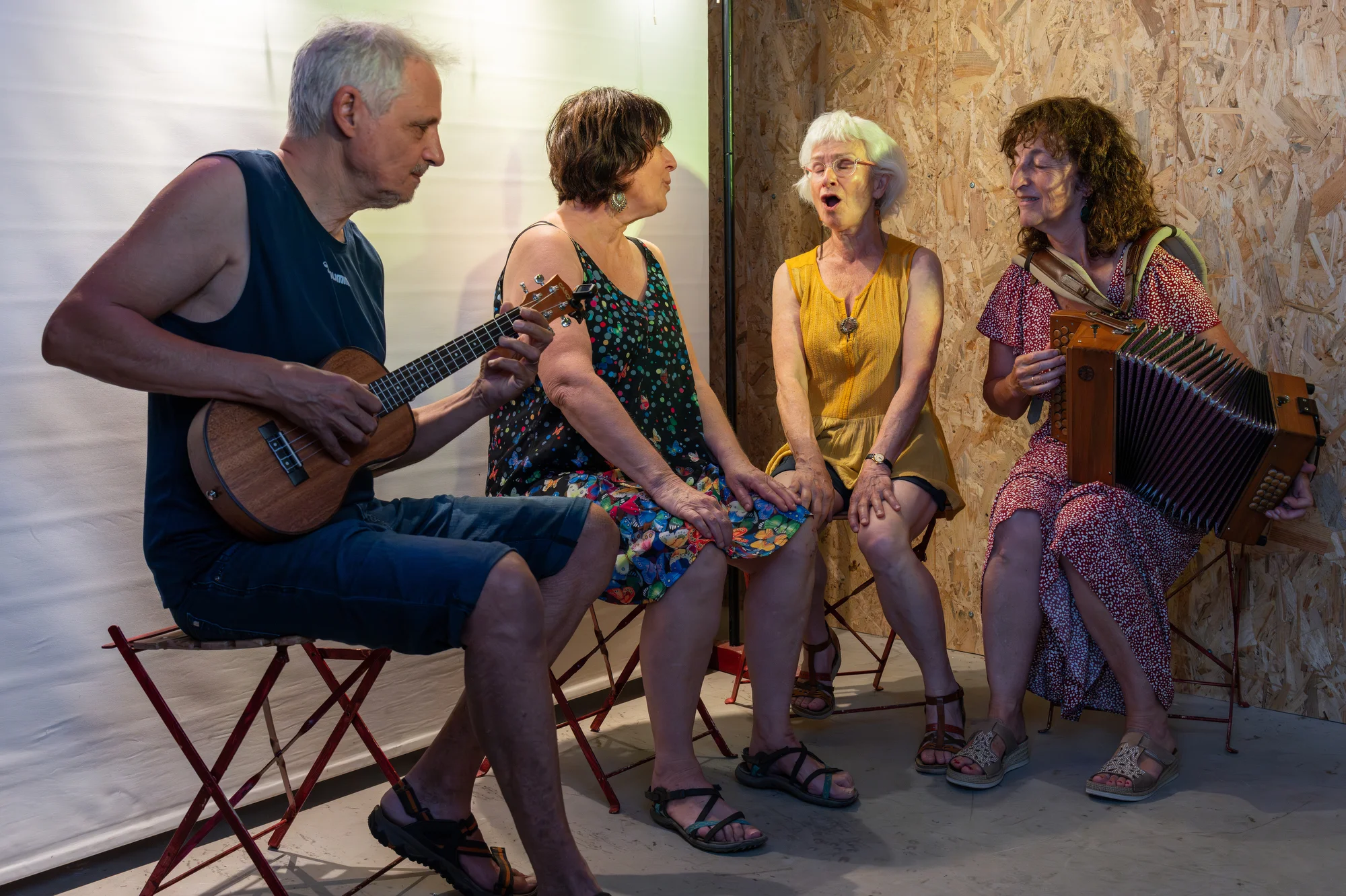 She rehearses for a home theatre play and musical with other comedians. This small scene can be set-up in any living room, Toulouse, France 2026.