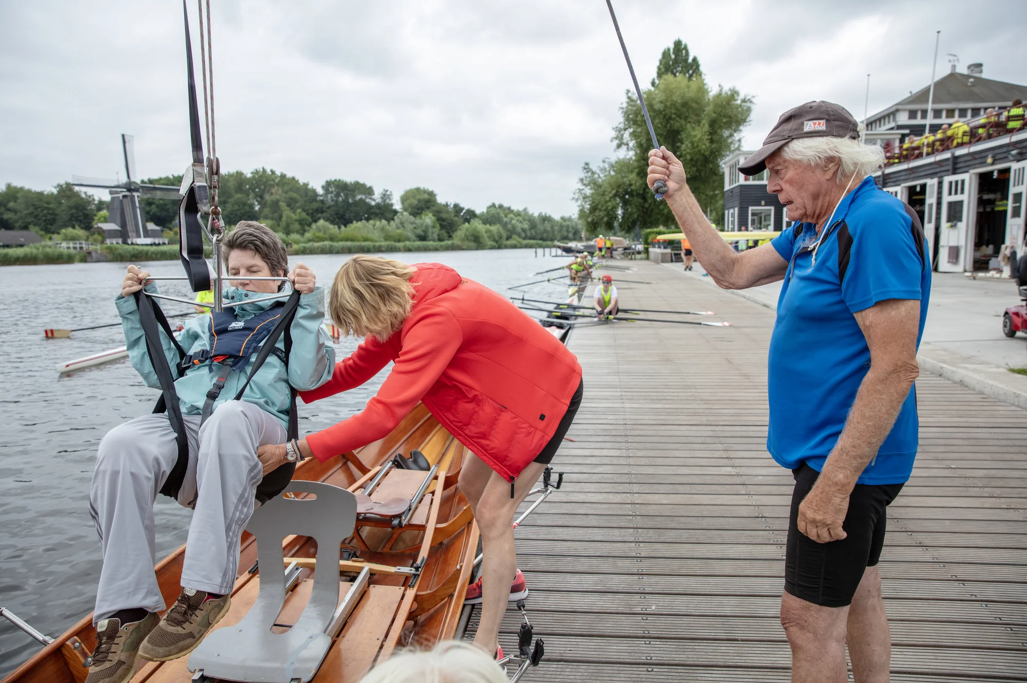 Ton van Schoonhoven coaches Femke who has cerebral palsy, who he works with once a week, at the Spaarne Rowing Club in Heemstede, Netherlands on July 18, 2026.