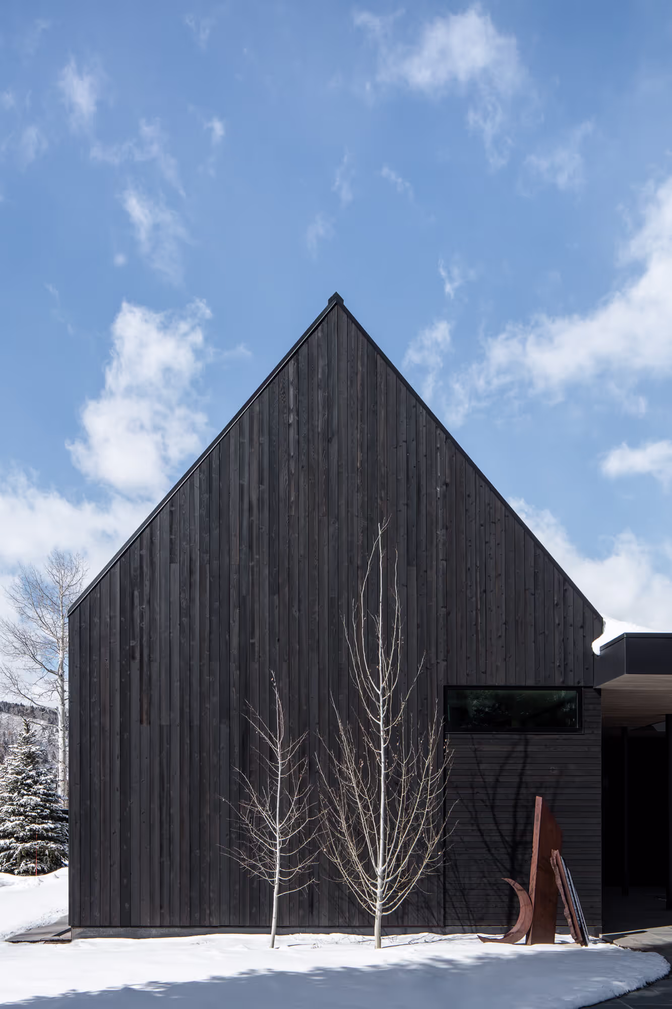 Modern black exterior of a custom home built by GF Woods
