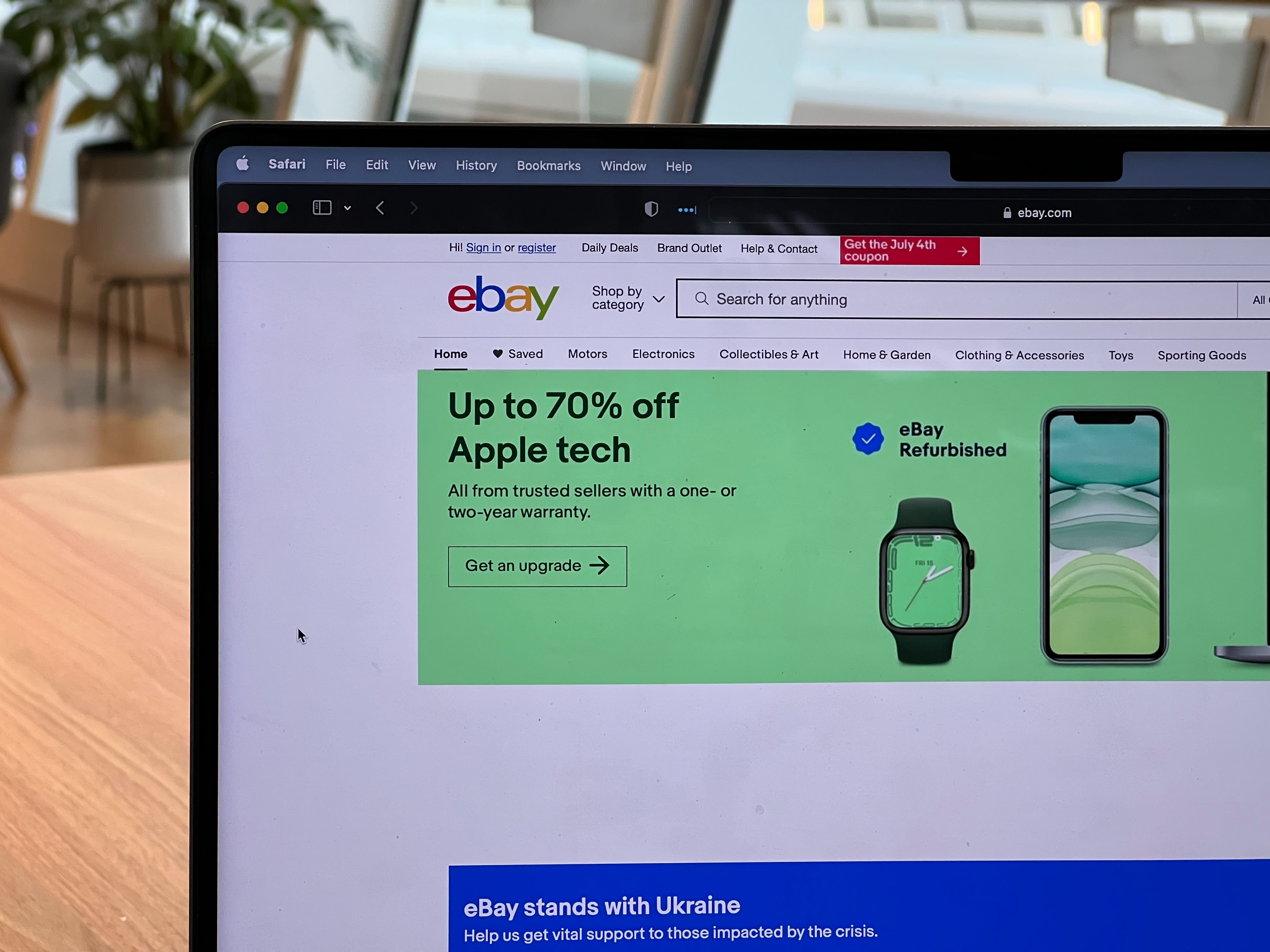 A picture of a laptop screen showing eBay's website