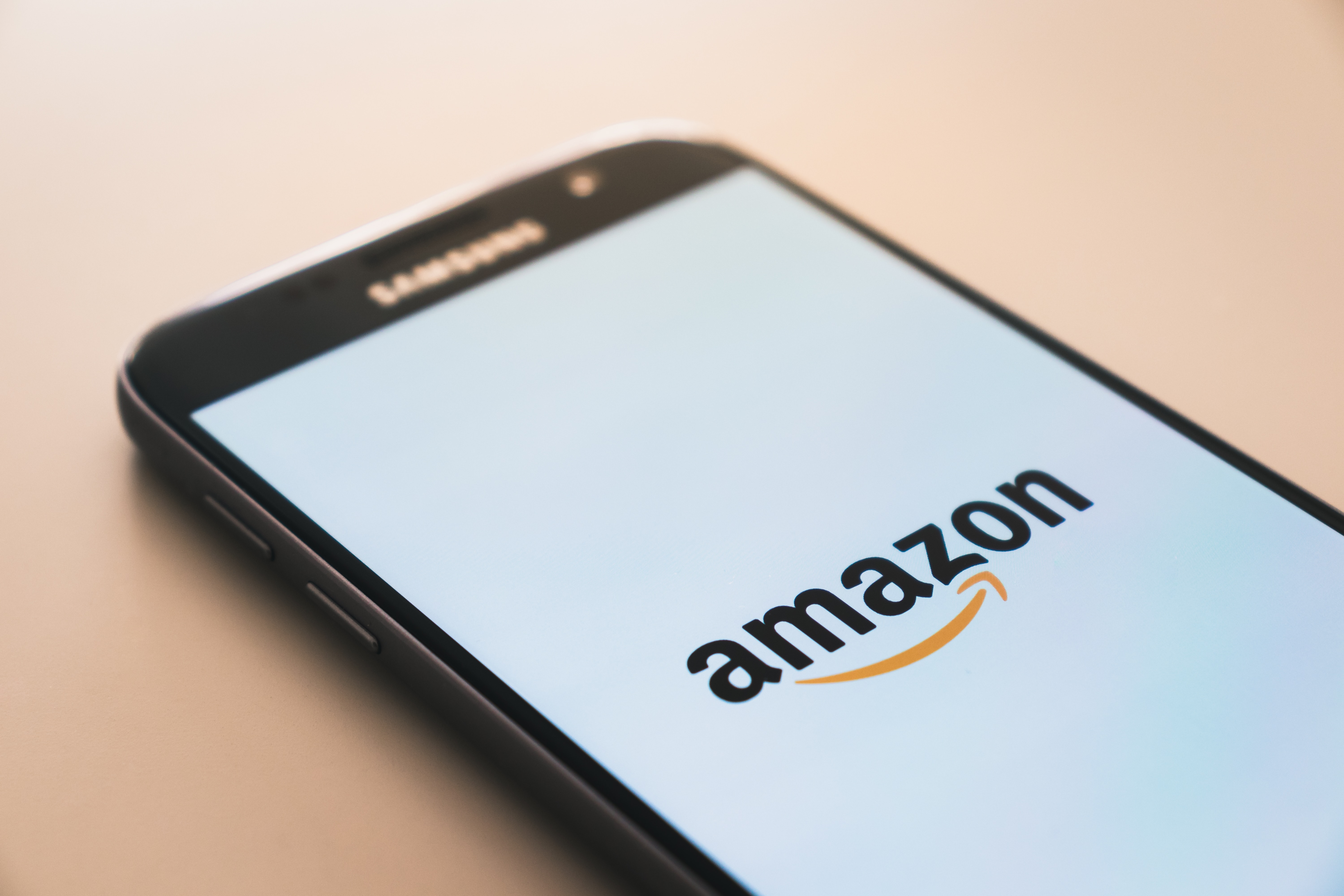 A phone screen showing the home page of Amazon