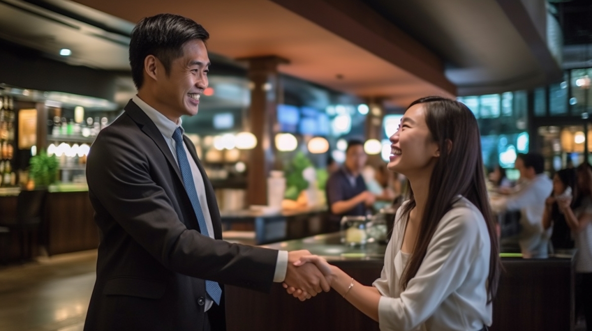 An image capturing a warm moment between a satisfied Filipino customer and a Filipino business owner. 