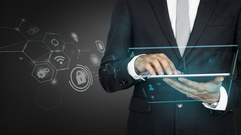 shared services, man holding a laptop, high tech