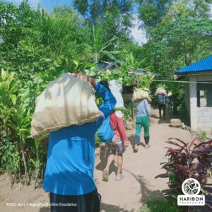 farmers carrying sacks
