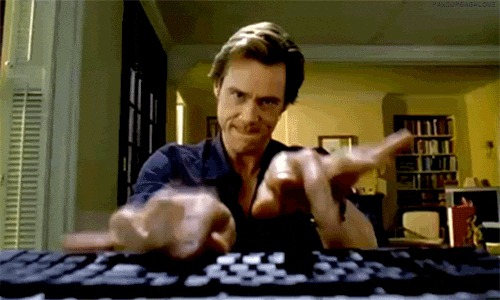 Funny GIF of Jim Carey typing at speed