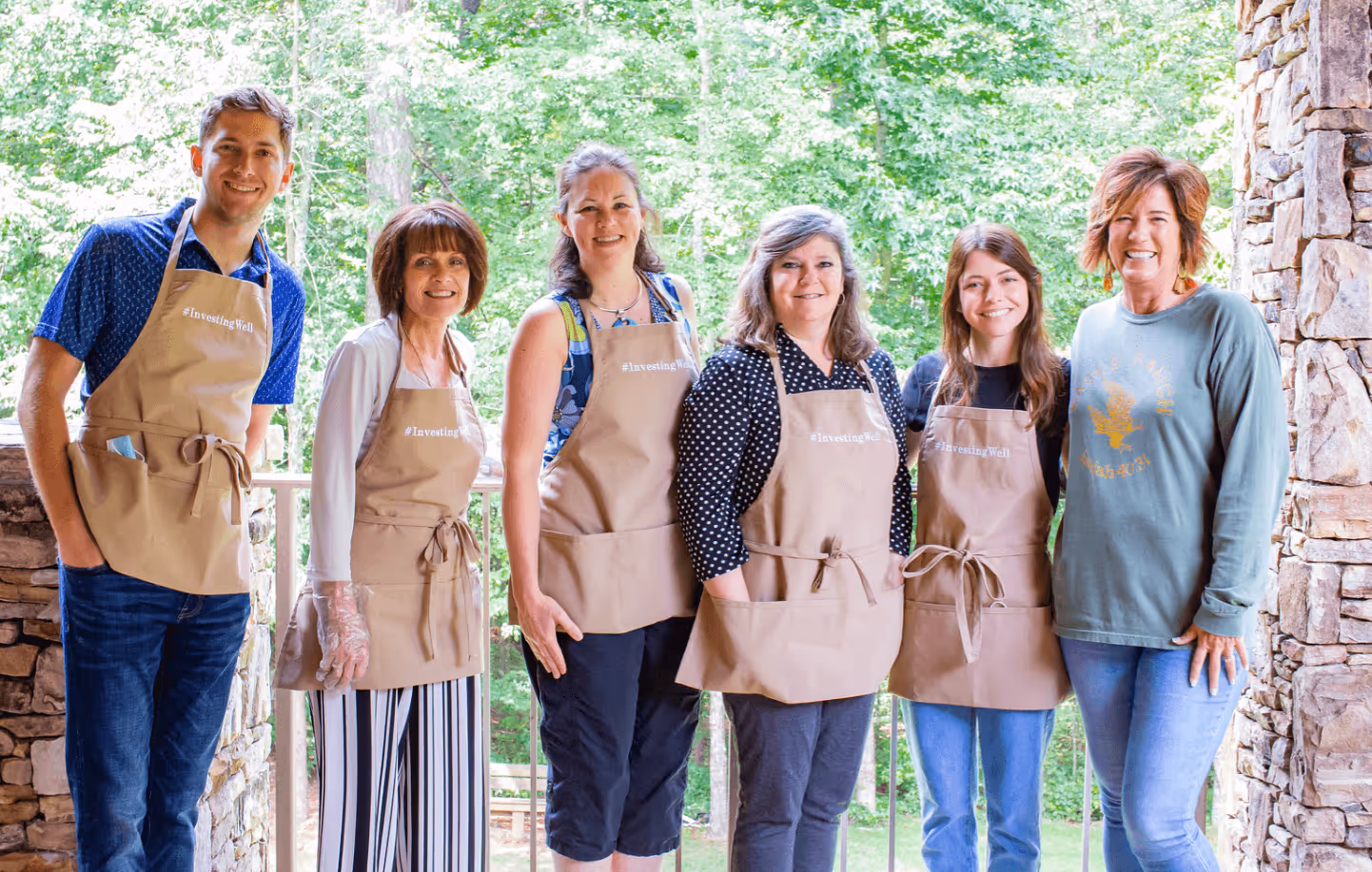 Volunteer group with aprons on