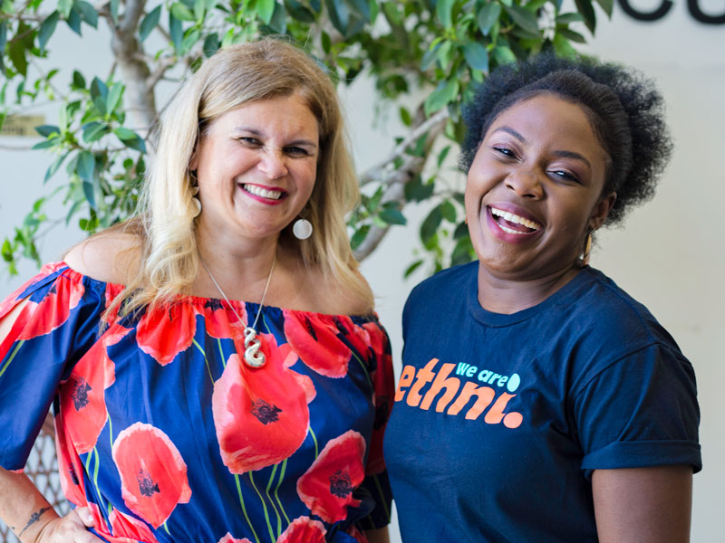 Ethni founders stand together smiling