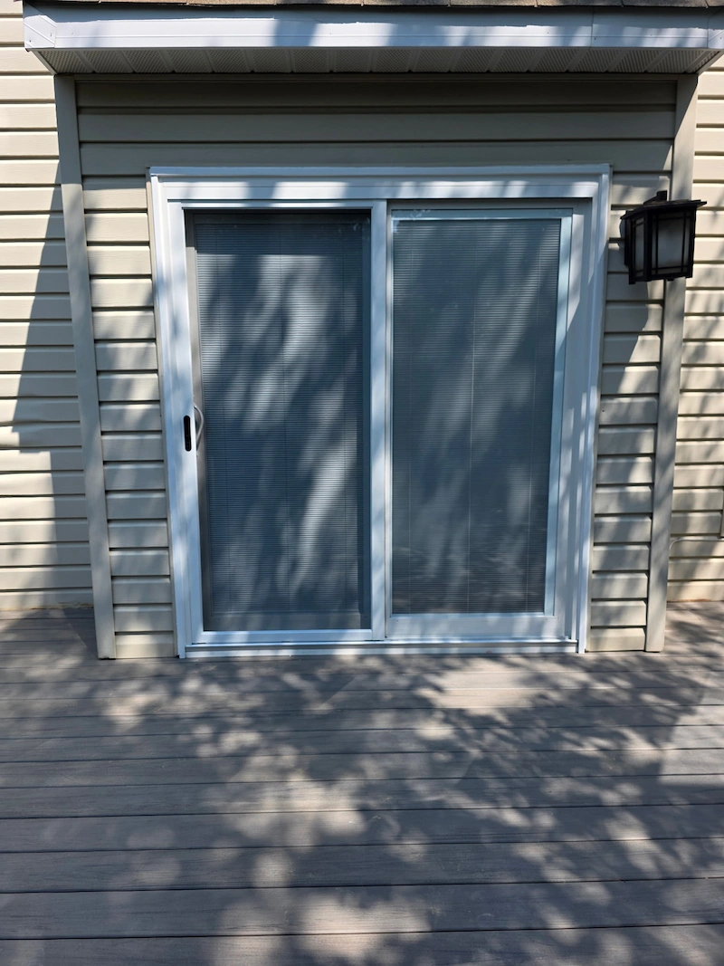 Exterior Picture of a Sliding glass door replacement with built-in blinds in Gaithersburg Maryland