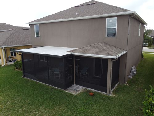 Screen Enclosure with Insulated Aluminum Roof Panels in Palm Bay, FL.