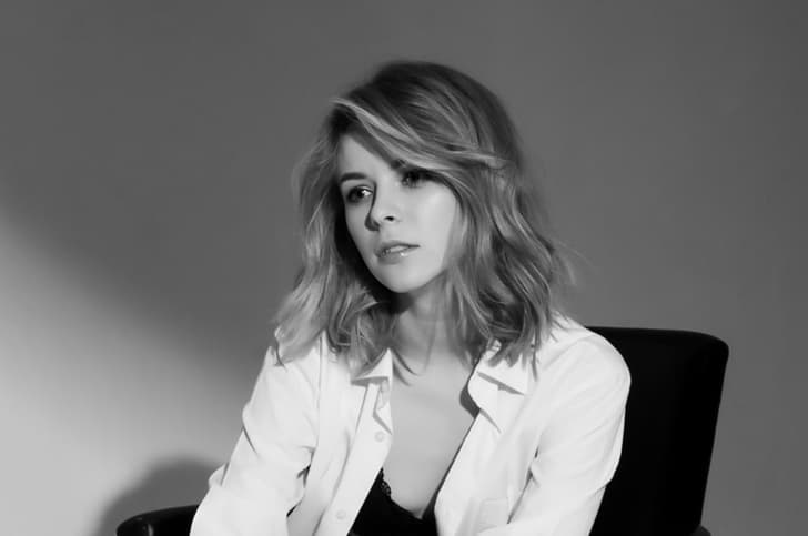 Black and white minimalist portrait of a woman.