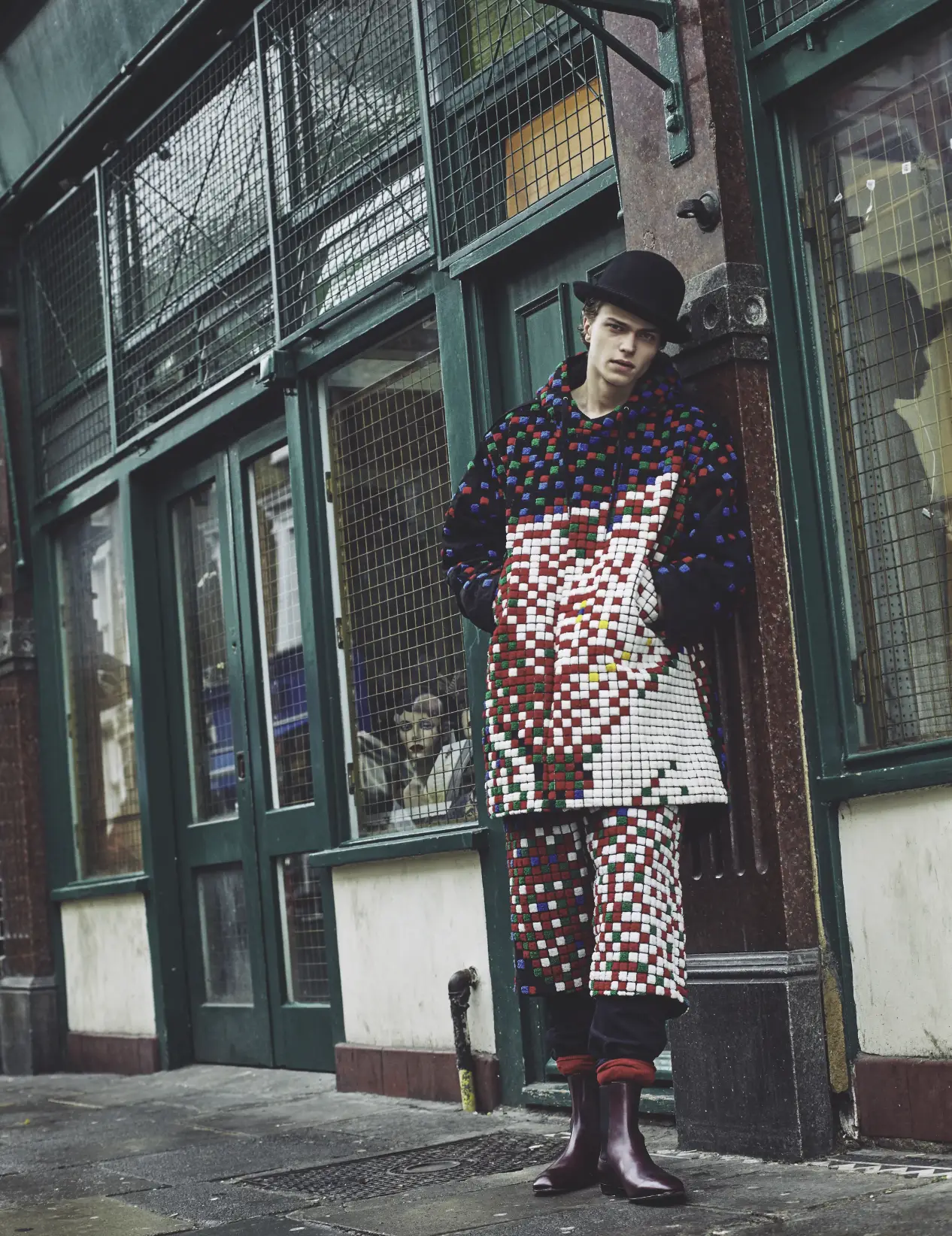 Picture of Jake love wearing a cool outfit in the streets of London for Sid magazine by the Parisian photographer nil Hope