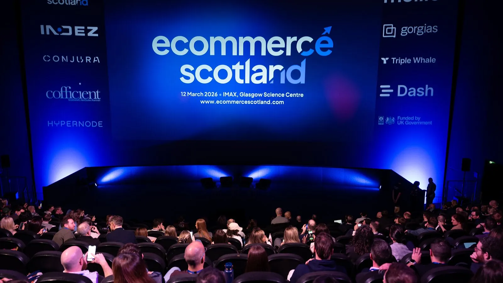 A full house at the IMAX facing the Ecommerce Scotland 2026 title screen