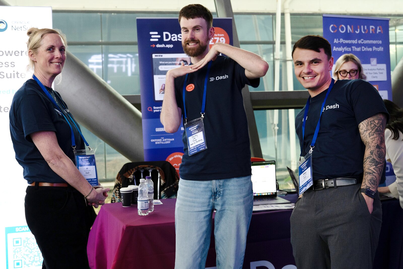 The Dash exhibitor stand at Ecommerce Scotland 2026, with the Conjura stand behind