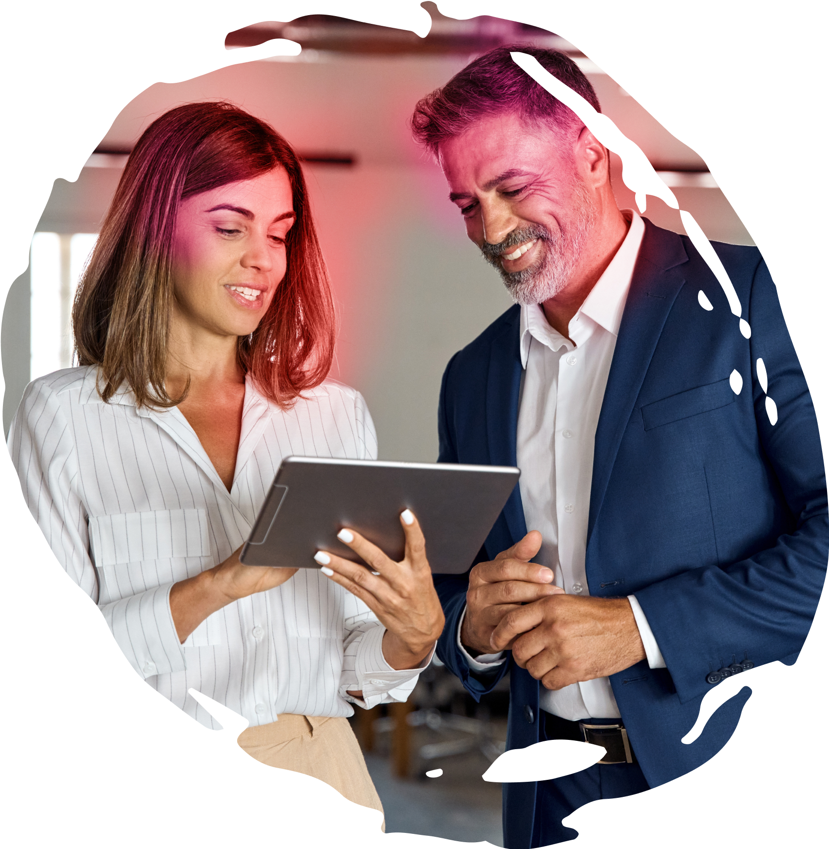 Two colleagues working together on a device to implement strategy