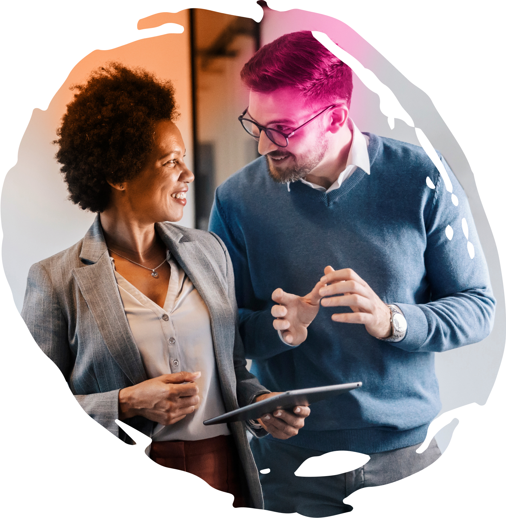 Colleagues using a tablet to collaborate on designing a new strategy