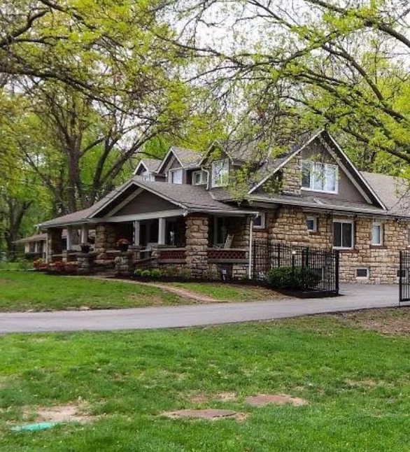 An exterior shot of the House of Hope in summer