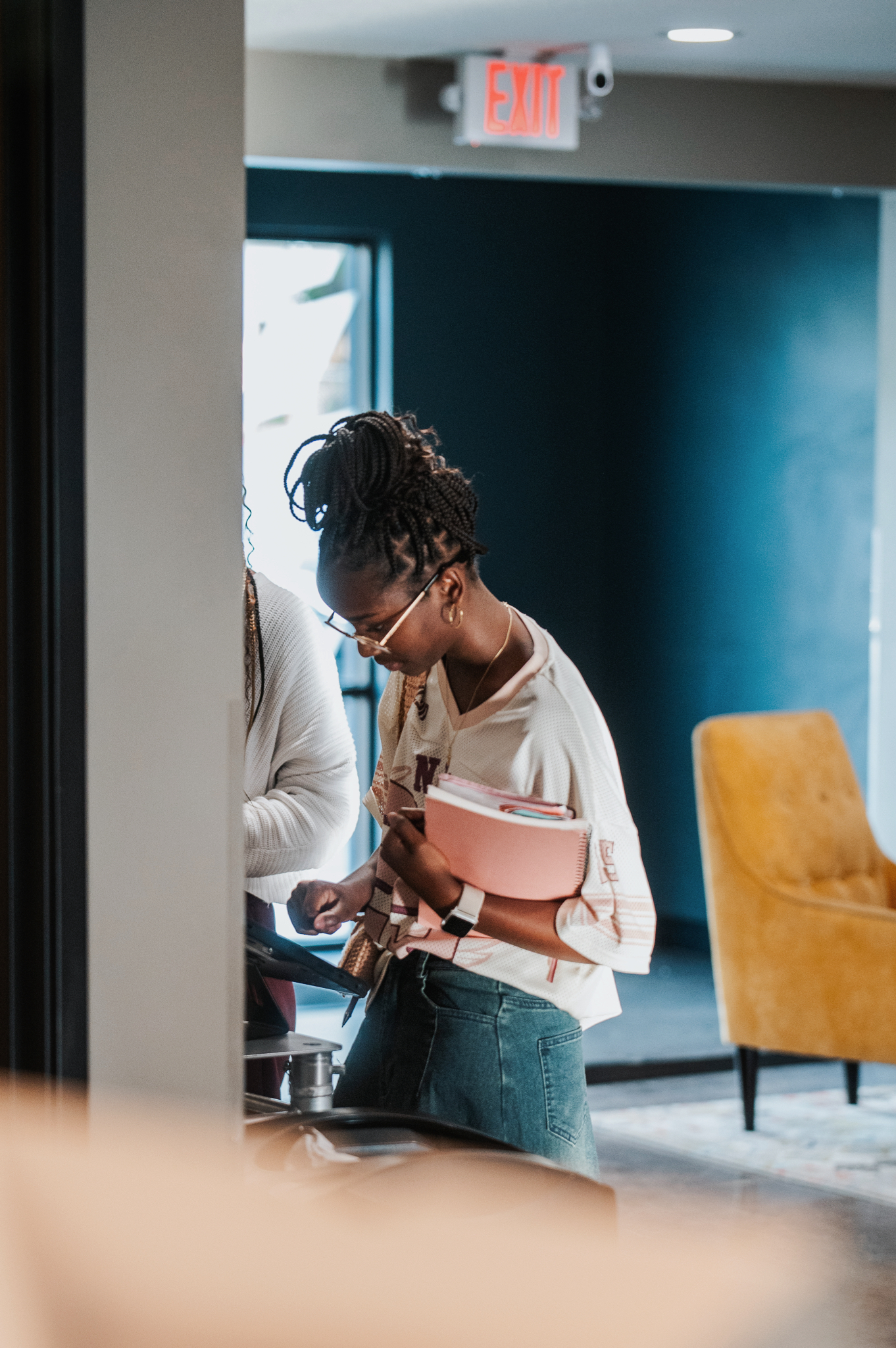 A modern, open-concept workspace filled with natural light and greenery, reflecting the clean and organized design of Nimbus Library.