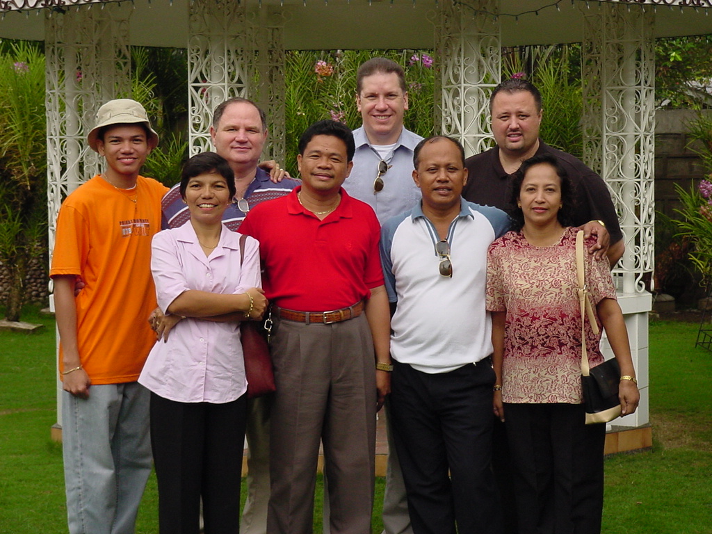 Pastor David posing for a photo with 7 other pastors and friends in the Philippines. 
