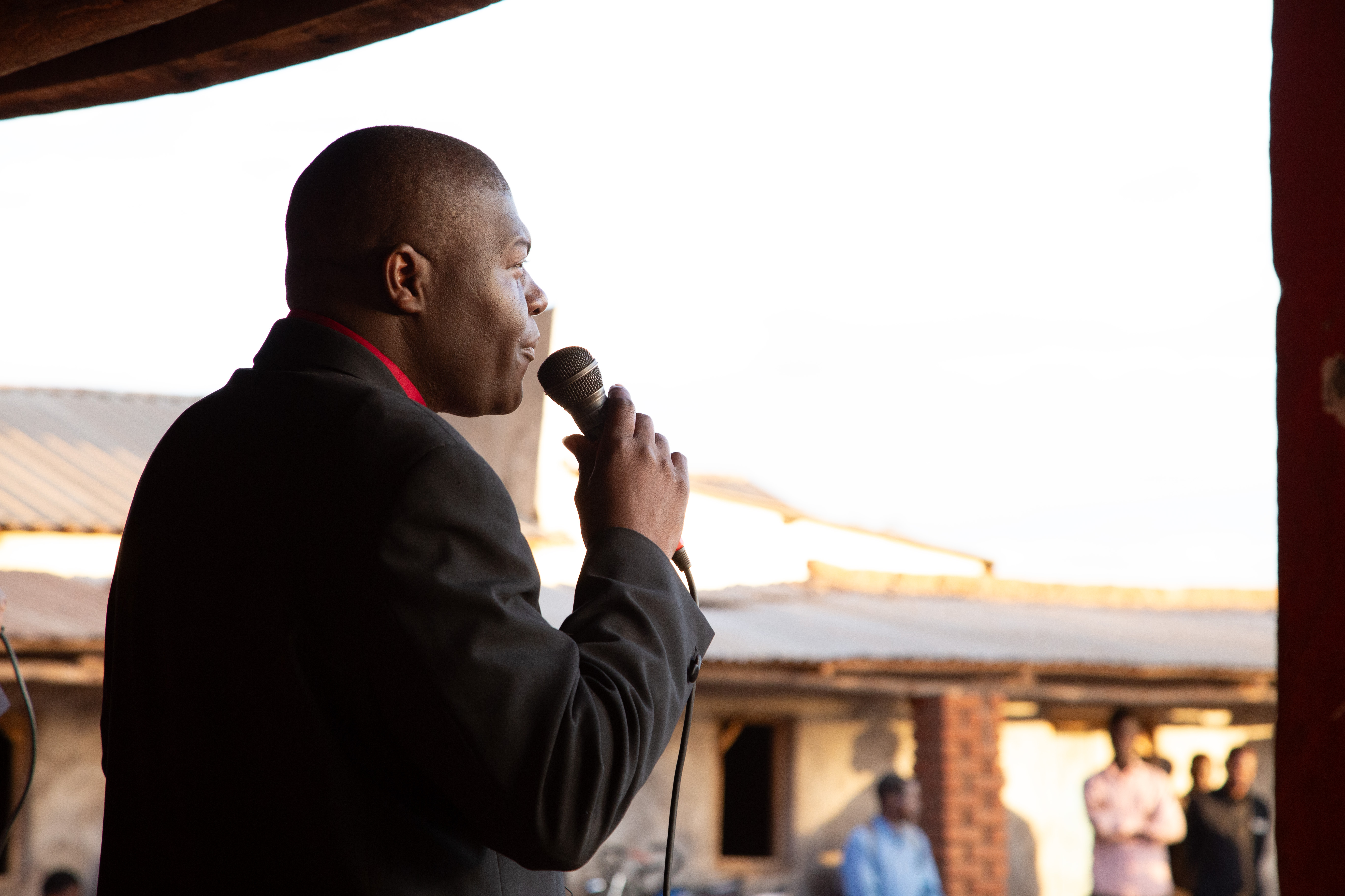 A man translating for Pastor David in Malawi