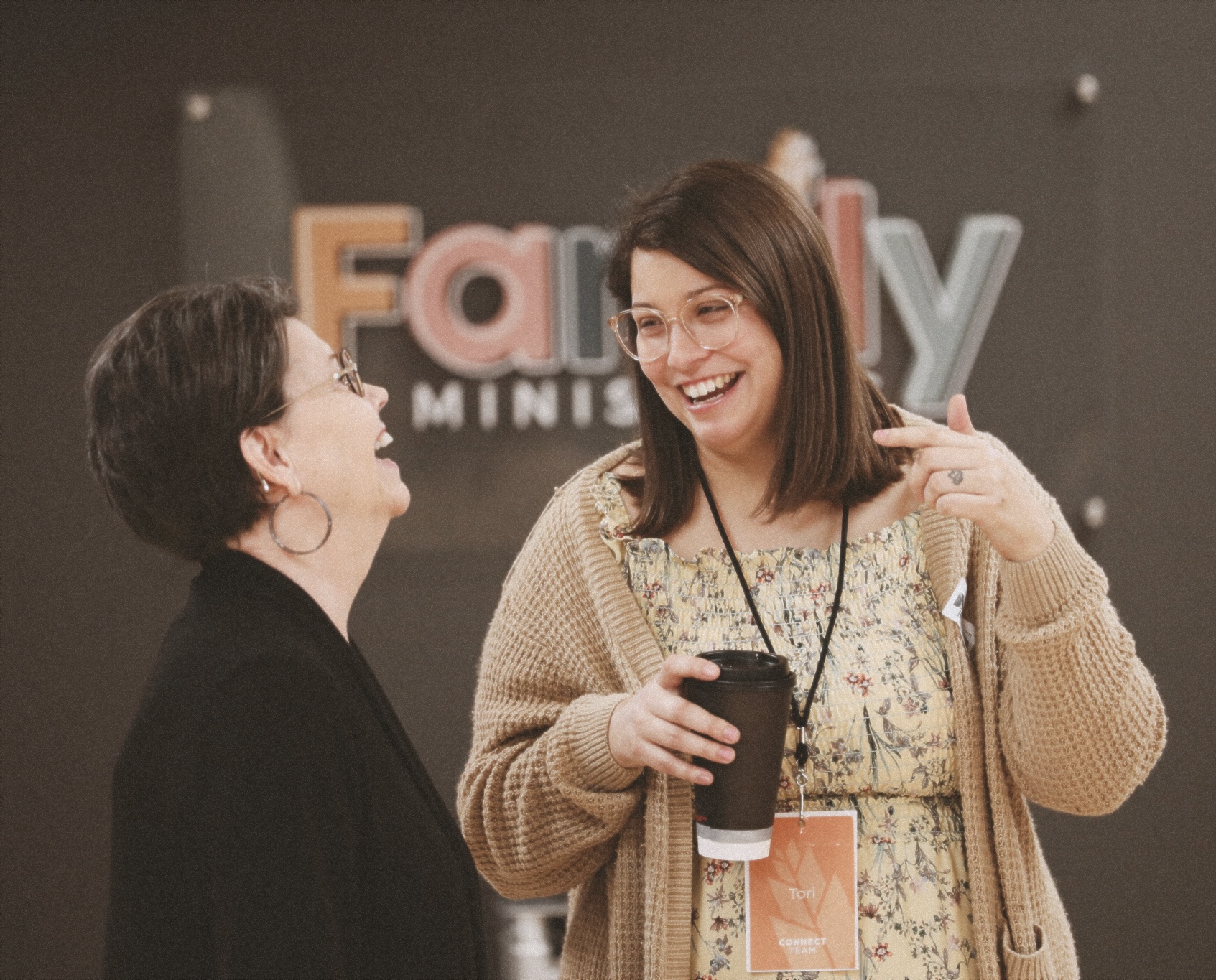 A high-tech manufacturing facility with a person walking through, representing the precision and reliability of Nimbus Library.