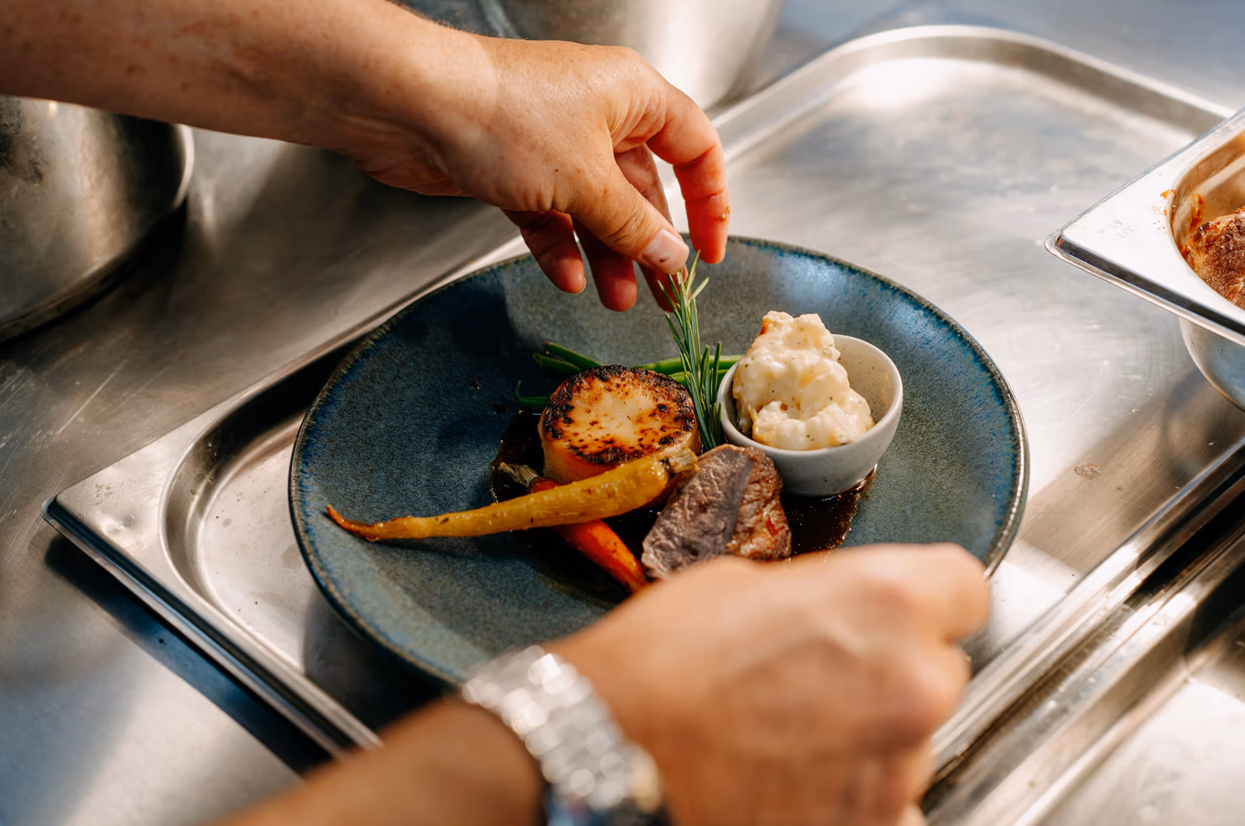 Food is presented neatly on a plate ready for service