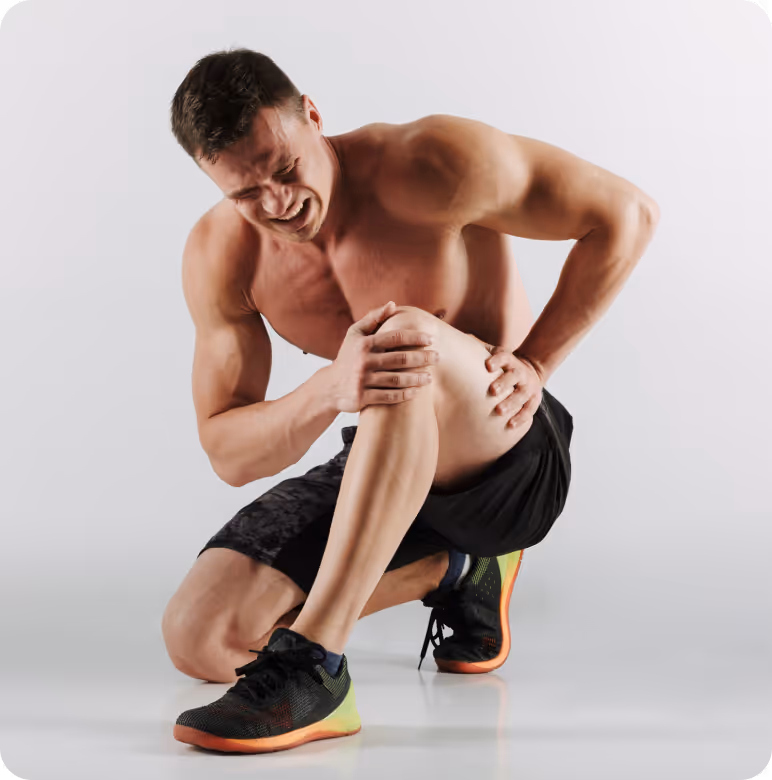 a person holding his knee