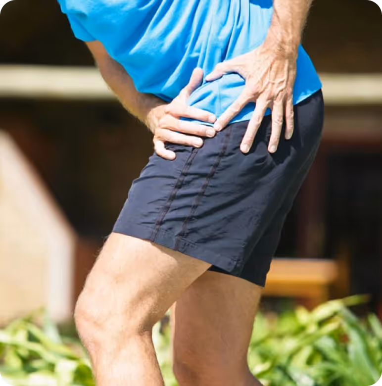 a person holding his back